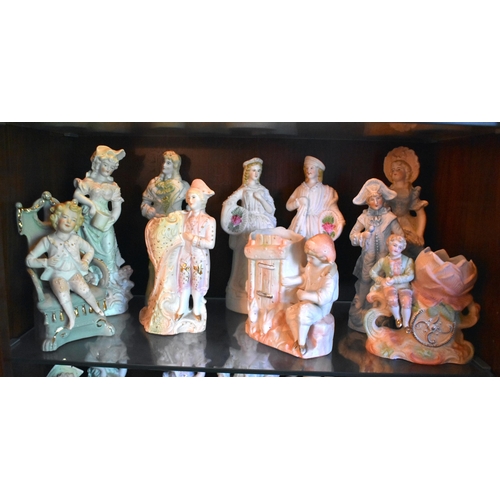 122 - A LARGE COLLECTION OF ANTIQUE GERMAN PORCELAIN BISQUE FIGURES in various forms and sizes. Largest 27... 