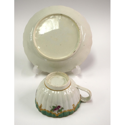 133 - 18th century Worcester rare Spotted Fruit Painter cup and saucer painted with fruit under green bord... 