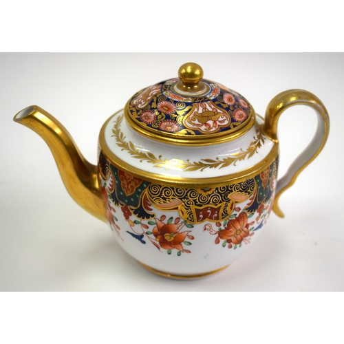 156 - 19th century small teapot and cover painted in an imari pattern. 11cm high