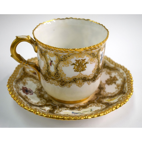 179 - Royal Worcester coffee cup and saucer made for the Scottish Walker Clan having intricate gilding and... 