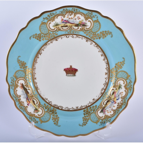 34 - A FINE EARLY 19TH CENTURY CHAMBERLAINS WORCESTER ARMORIAL PLATE painted with panels of birds within ... 