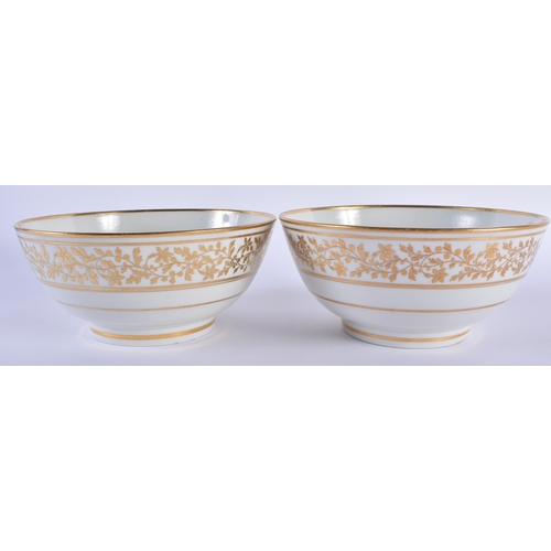 44 - A PAIR OF EARLY 19TH CENTURY BARR WORCESTER PORCELAIN SLOP BOWLS painted with gilt foliage on a whit... 