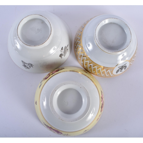 74 - A GROUP OF THREE EARLY 19TH CENTURY WORCESTER SLOP BOWLS including an armorial eagle bowl. 17 cm dia... 