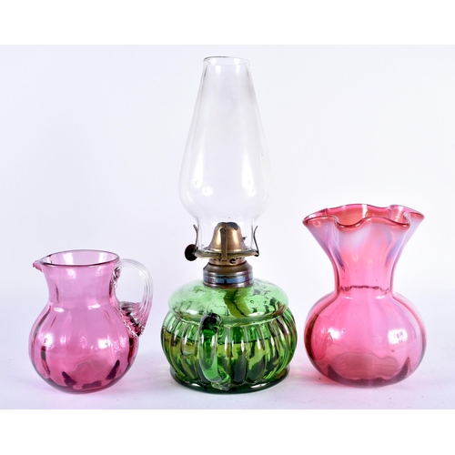 79 - A MONART SCOTTISH GLASS BOWL together with a cranberry vase etc. 22cm high. (4)