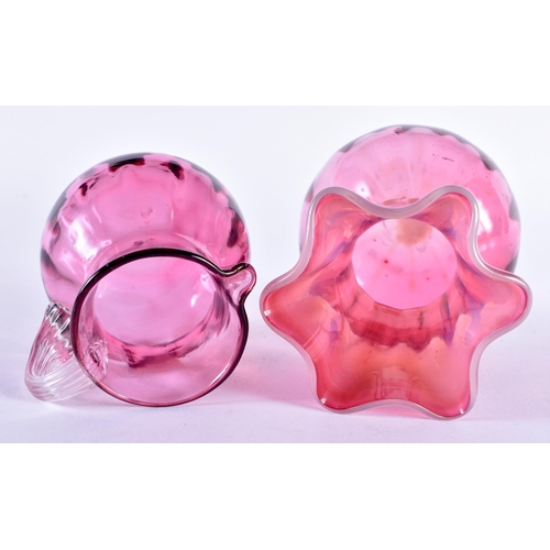 79 - A MONART SCOTTISH GLASS BOWL together with a cranberry vase etc. 22cm high. (4)