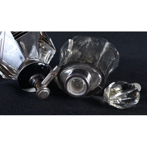 82 - AN ART DECO SILVER AND ENAMEL GLASS SCENT BOTTLE together with another silver mounted bottle. Larges... 