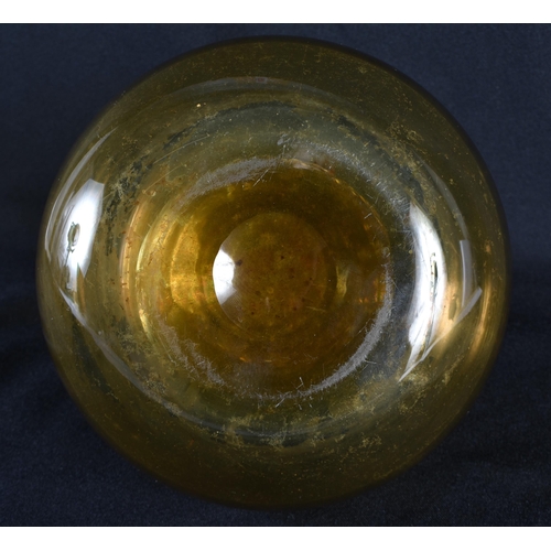 84 - A VICTORIAN SILVER MOUNTED SMOKEY AMBER GLASS DECANTER. 18 cm x 14 cm.