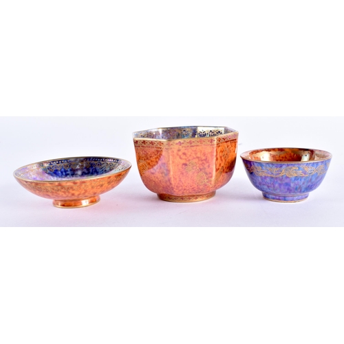 85 - A WEDGWOOD ORANGE LUSTRE OCTAGONAL TEABOWL together with a similar teabowl and smaller dish. Largest... 