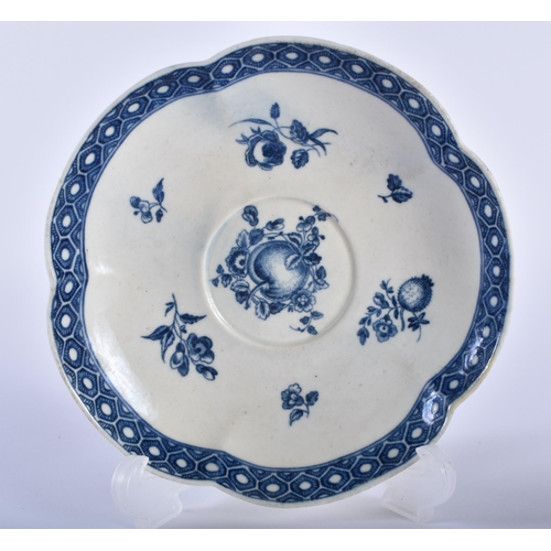 9 - A RARE 18TH CENTURY WORCESTER BLUE AND WHITE TEACUP AND SAUCER decorated with the Fruit Sprigs Borde... 