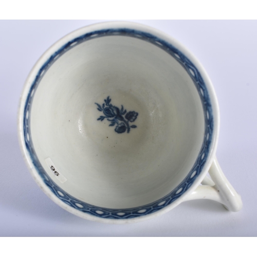 9 - A RARE 18TH CENTURY WORCESTER BLUE AND WHITE TEACUP AND SAUCER decorated with the Fruit Sprigs Borde... 