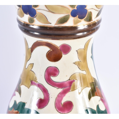 95 - A PAIR OF 19TH CENTURY CONTINENTAL POTTERY GOURD VASES in the manner of Zsolnay or Fischer, painted ... 