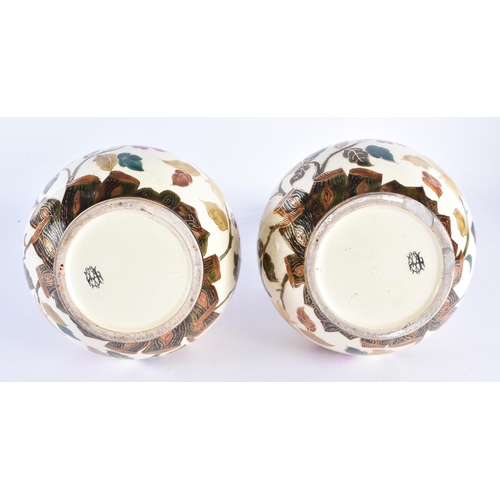 95 - A PAIR OF 19TH CENTURY CONTINENTAL POTTERY GOURD VASES in the manner of Zsolnay or Fischer, painted ... 