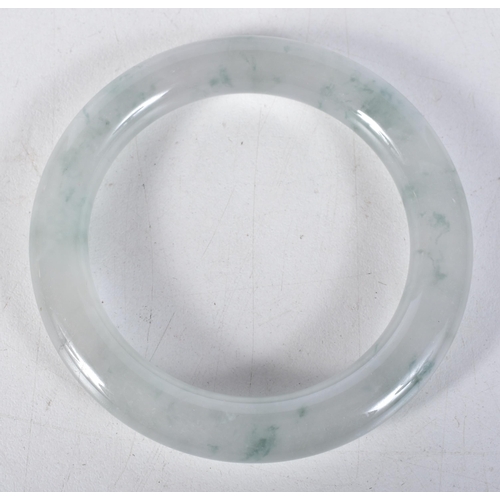 3770 - A Chinese jade bangle 7.5cm.