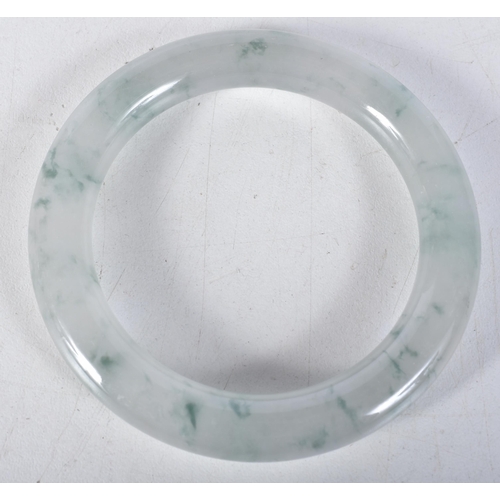 3770 - A Chinese jade bangle 7.5cm.