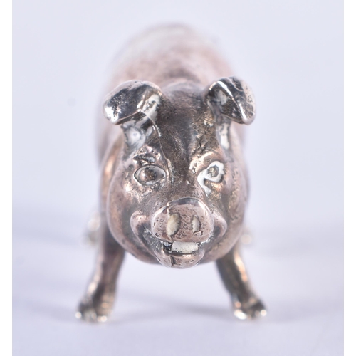 105 - AN ENGLISH SILVER FIGURE OF A PIG. London 1988. 35 grams. 4 cm wide.