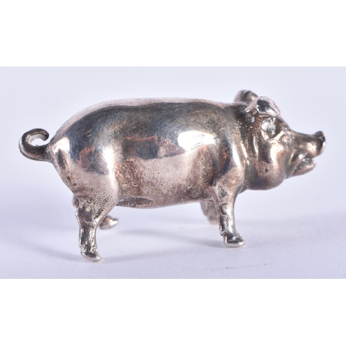 105 - AN ENGLISH SILVER FIGURE OF A PIG. London 1988. 35 grams. 4 cm wide.