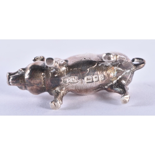 105 - AN ENGLISH SILVER FIGURE OF A PIG. London 1988. 35 grams. 4 cm wide.