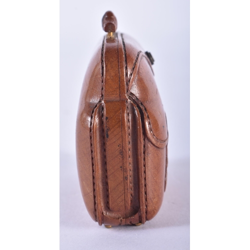 114 - A RARE VICTORIAN CARVED TREEN WOOD NOVELTY PURSE formed as a gladstone type bag. 7.5 cm x 6 cm. Note... 