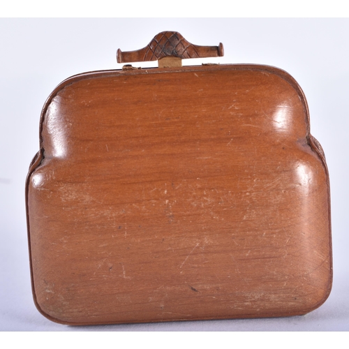 114 - A RARE VICTORIAN CARVED TREEN WOOD NOVELTY PURSE formed as a gladstone type bag. 7.5 cm x 6 cm. Note... 