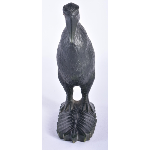 118 - A CARVED STONE FIGURE OF A NEW ZEALAND KIWI BIRD. 11 cm high.