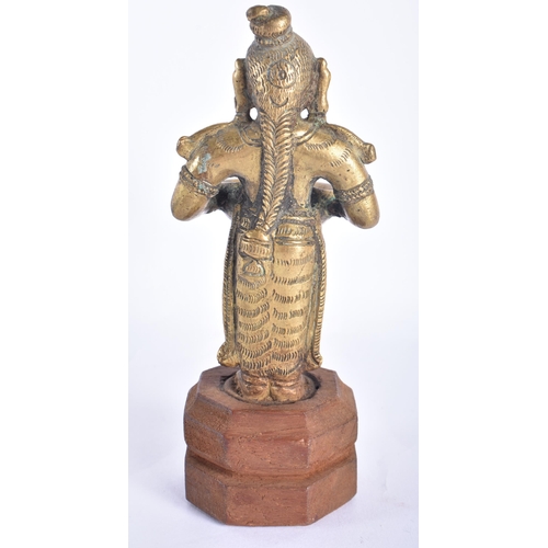 119 - AN 18TH/19TH CENTURY INDIAN BRONZE FIGURE OF A DEITY. 16.5 cm high.