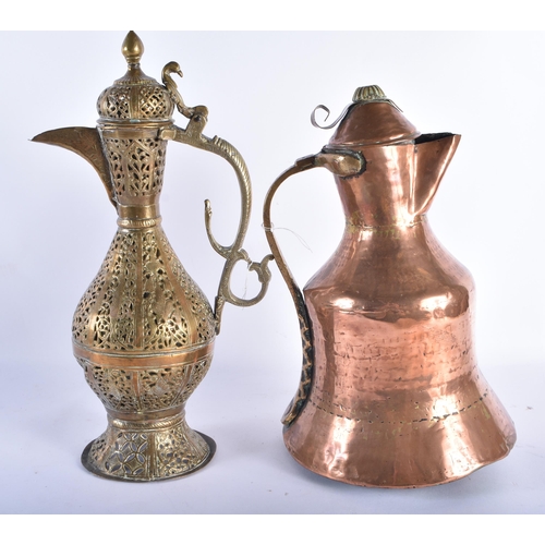 120 - AN 18TH/19TH CENTURY ISLAMIC MIDDLE EASTERN RETICULATED BRASS EWER together with a copper jug. Large... 