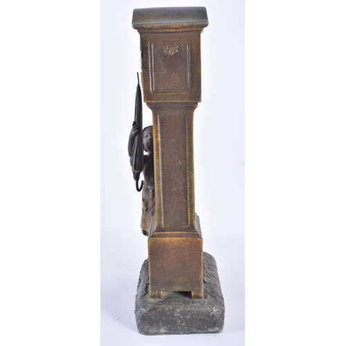 121 - AN ART DECO COLD PAINTED SPELTER FIGURAL CLOCK. 35 cm high.