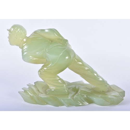 128 - A VERY RARE CHINESE CULTURAL REVOLUTION CARVED JADE FIGURE OF A SOLDIER modelled leaning forward upo... 