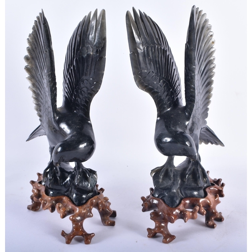 131 - A LARGE PAIR OF 19TH CENTURY CHINESE CARVED JADE FIGURES OF BIRDS Late Qing. 25 cm x 14 cm.