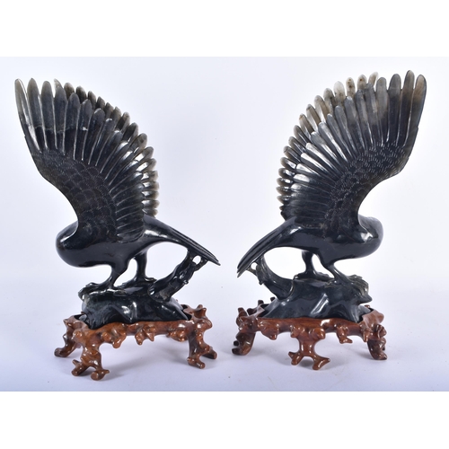 131 - A LARGE PAIR OF 19TH CENTURY CHINESE CARVED JADE FIGURES OF BIRDS Late Qing. 25 cm x 14 cm.