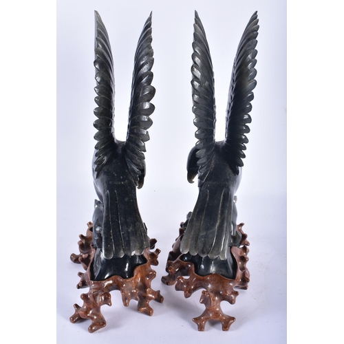 131 - A LARGE PAIR OF 19TH CENTURY CHINESE CARVED JADE FIGURES OF BIRDS Late Qing. 25 cm x 14 cm.