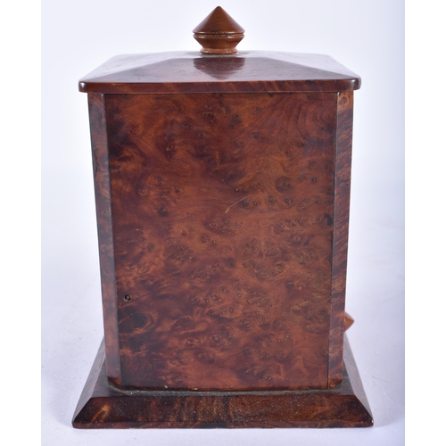 132 - AN EARLY 20TH CENTURY ENGLISH CARVED BURR WOOD SMOKERS COMPENDIUM the pull out drawer revealing a ma... 