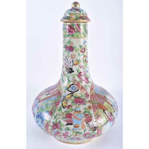 137 - A LARGE 19TH CENTURY CHINESE CANTON FAMILLE ROSE BOTTLE NECK VASE AND COVER Qing, painted with typic... 