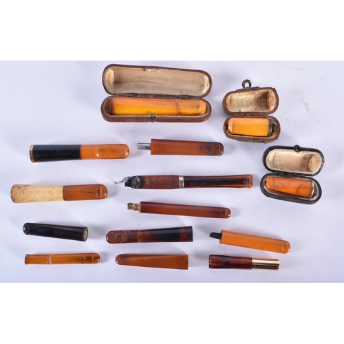 153 - A COLLECTION OF VINTAGE MAINLY AMBER & BAKELITE CHEROOTS. (qty)