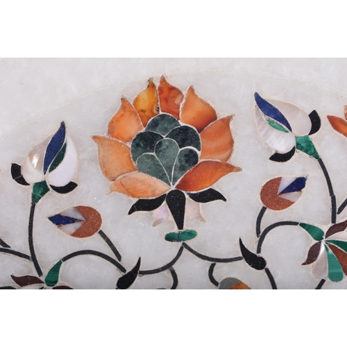 159 - AN INDIAN AGRA MARBLE MIXED HARDSTONE PLAQUE. 20 cm diameter.