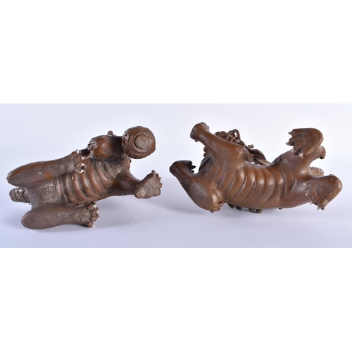 166 - A PAIR OF 19TH CENTURY CHINESE CARVED YIXING STONEWARE BUDDHISTIC LIONS Qing. 18 cm x 20 cm.