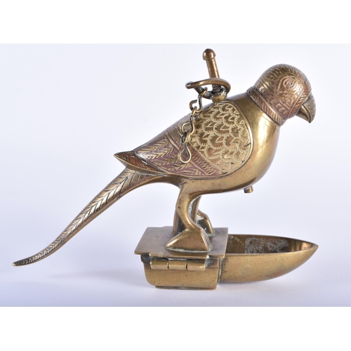 171 - AN UNUSUAL 19TH CENTURY ISLAMIC MIDDLE EASTERN BRONZE HANGING OIL BURNER formed as a standing bird. ... 