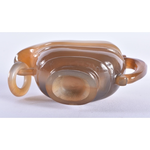 172 - A 19TH CENTURY CHINESE CARVED AGATE LIBATION CUP Qing, of plain form with ring handle. 7.5 cm x 5 cm... 