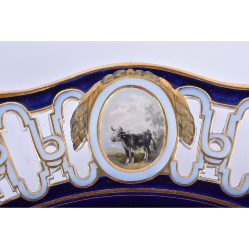 174 - A FINE AND RARE 19TH CENTURY MEISSEN RETICULATED PORCELAIN CABINET PLATE painted with cattle and a f... 