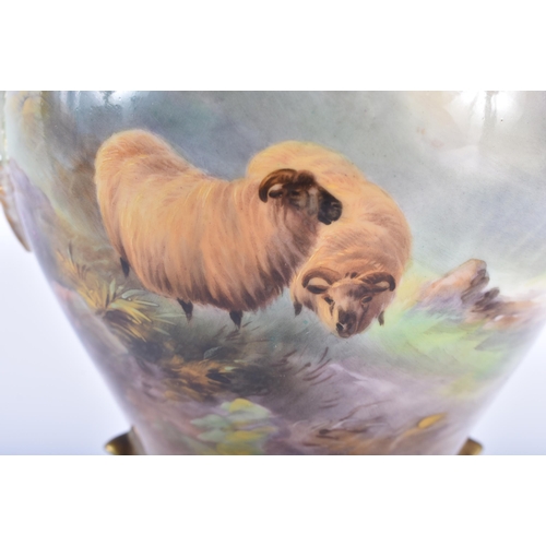 176 - A LOVELY ROYAL WORCESTER TWIN HANDLED HARRY DAVIS PORCELAIN VASE painted with sheep within a landsca... 