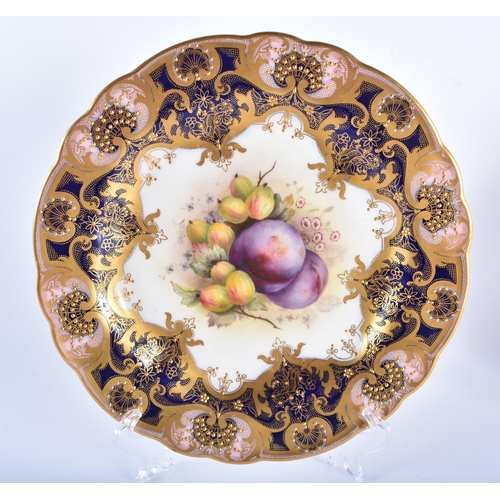 178 - A PAIR OF ROYAL WORCESTER FRUIT PAINTED CABINET PLATES by Shuck, together with a similar plate paint... 