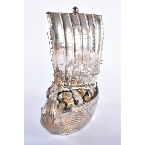 179 - A LOVELY AND UNUSUAL EARLY 20TH CENTURY JAPANESE MEIJI PERIOD SILVER BOAT formed with a hoard of tre... 