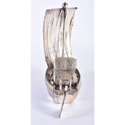 179 - A LOVELY AND UNUSUAL EARLY 20TH CENTURY JAPANESE MEIJI PERIOD SILVER BOAT formed with a hoard of tre... 