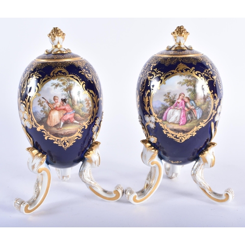 182 - A FINE PAIR OF 19TH CENTURY MEISSEN EGG FORM PORCELAIN VASES AND COVERS painted with lovers on a dee... 