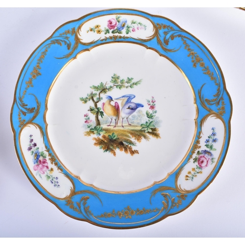 186 - A SET OF FOUR 19TH CENTURY FRENCH SEVRES PORCELAIN PLATES painted with birds under a typical blue an... 