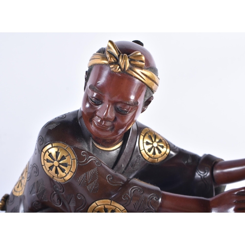 188 - A FINE 19TH CENTURY JAPANESE MEIJI PERIOD BRONZE GOLD ONLAID OKIMONO by Miyao, modelled as a father ... 