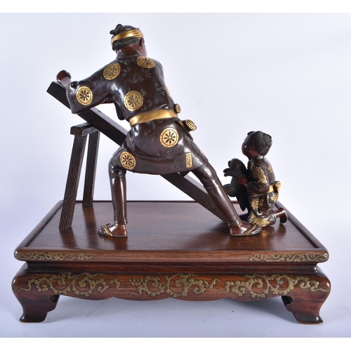 188 - A FINE 19TH CENTURY JAPANESE MEIJI PERIOD BRONZE GOLD ONLAID OKIMONO by Miyao, modelled as a father ... 