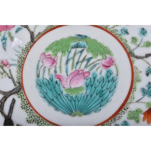 199 - A LATE 19TH CENTURY CHINESE FAMILLE ROSE PORCELAIN BARBED PLATE Guangxu, bearing Jiaqing marks to ba... 