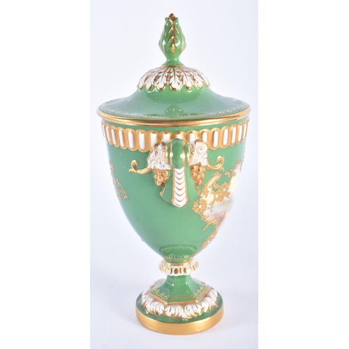 203 - A ROYAL WORCESTER TWIN HANDLED PORCELAIN VASE AND COVER by Harry Stinton. 18 cm x 12 cm.