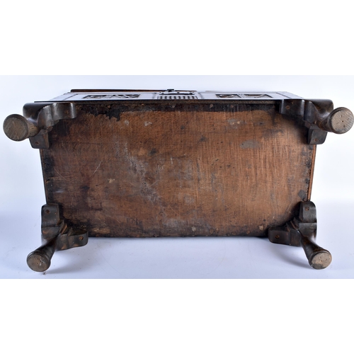 215 - A SMALL 18TH CENTURY CARVED OAK COFFER upon later feet, initialled SW & bearing date 97. 65 cm x 35 ... 